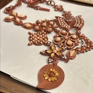 Chic Butterfly and Floral Necklace in Warm Tones